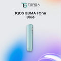 A light blue IQOS ILUMA ONE disposable vape device shown vertically against a white background with a soft blue and purple gradient at the bottom. The brand logo 'TEREA BLENDS' is visible at the top, along with the text 'IQOS ILUMA I One Blue'.